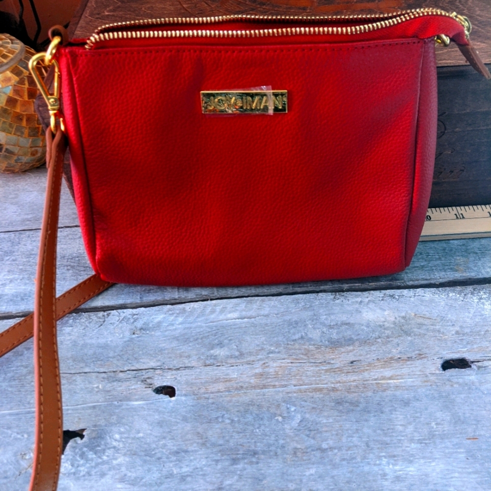 Never used. Like new. Joy and Iman handbag